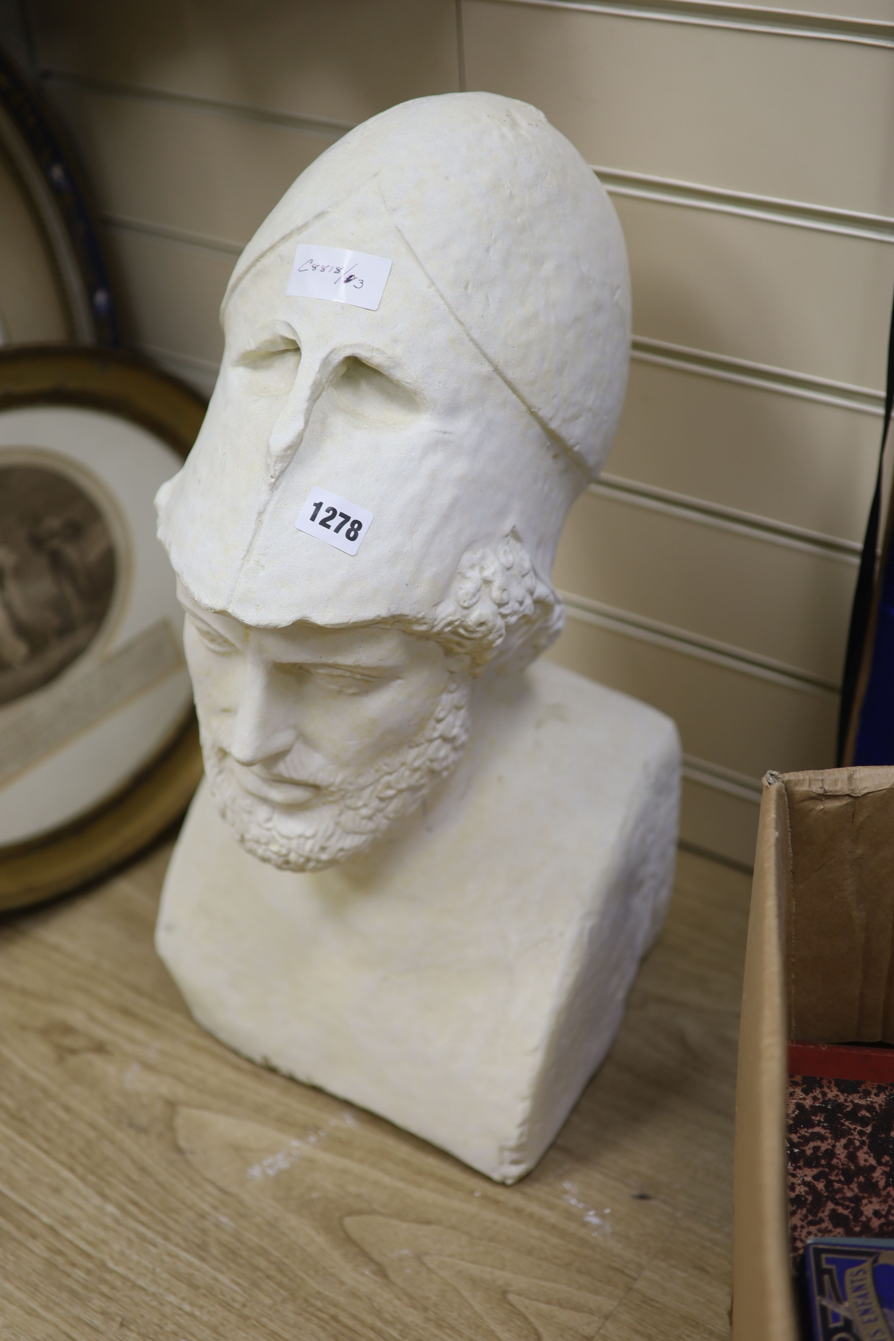 After the Antique. A cast limestone composite bust of a bearded gentleman